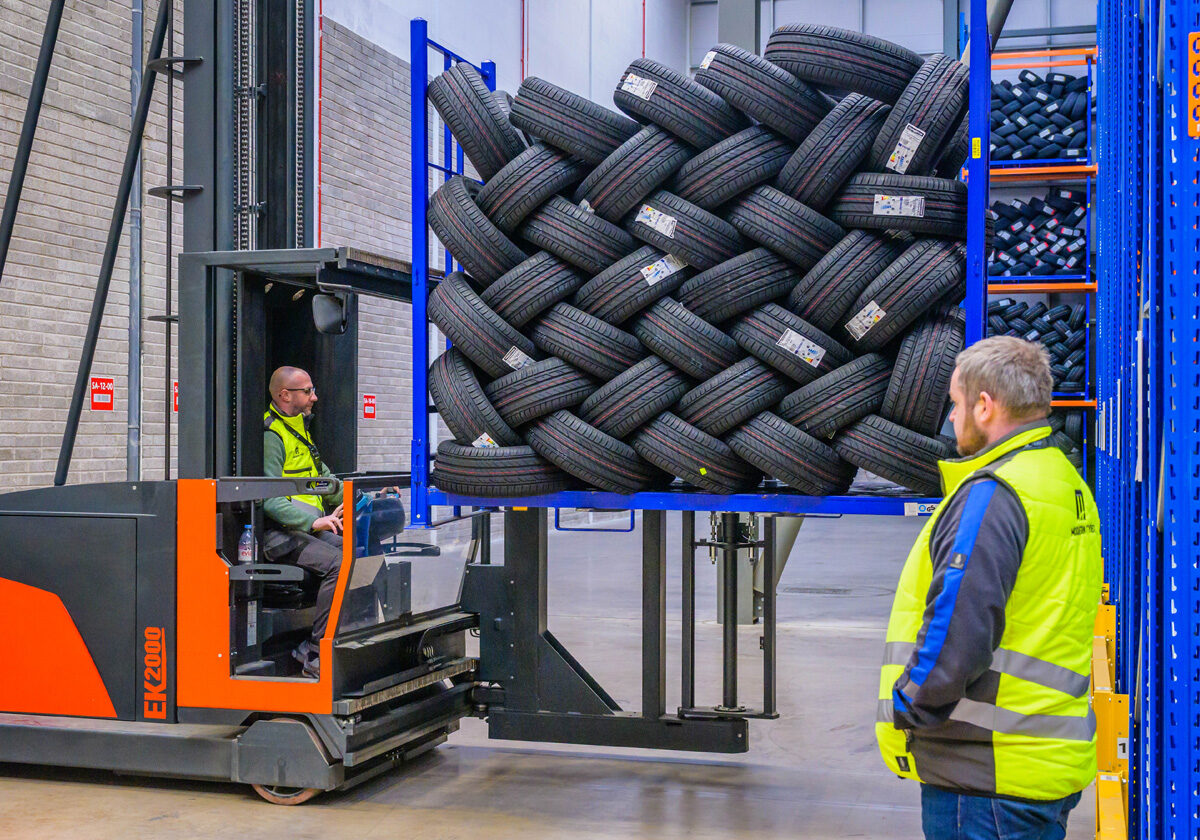 Forklift moving tyres inside the Modern Tyres warehouse